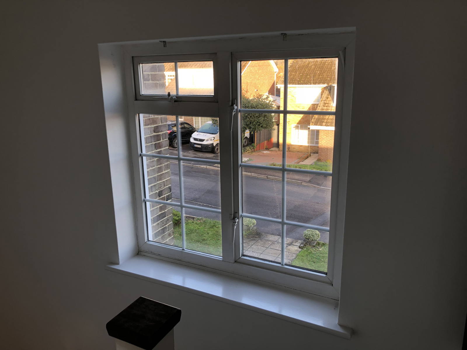 Original landing window from 1970s with poor sound and thermal insulation