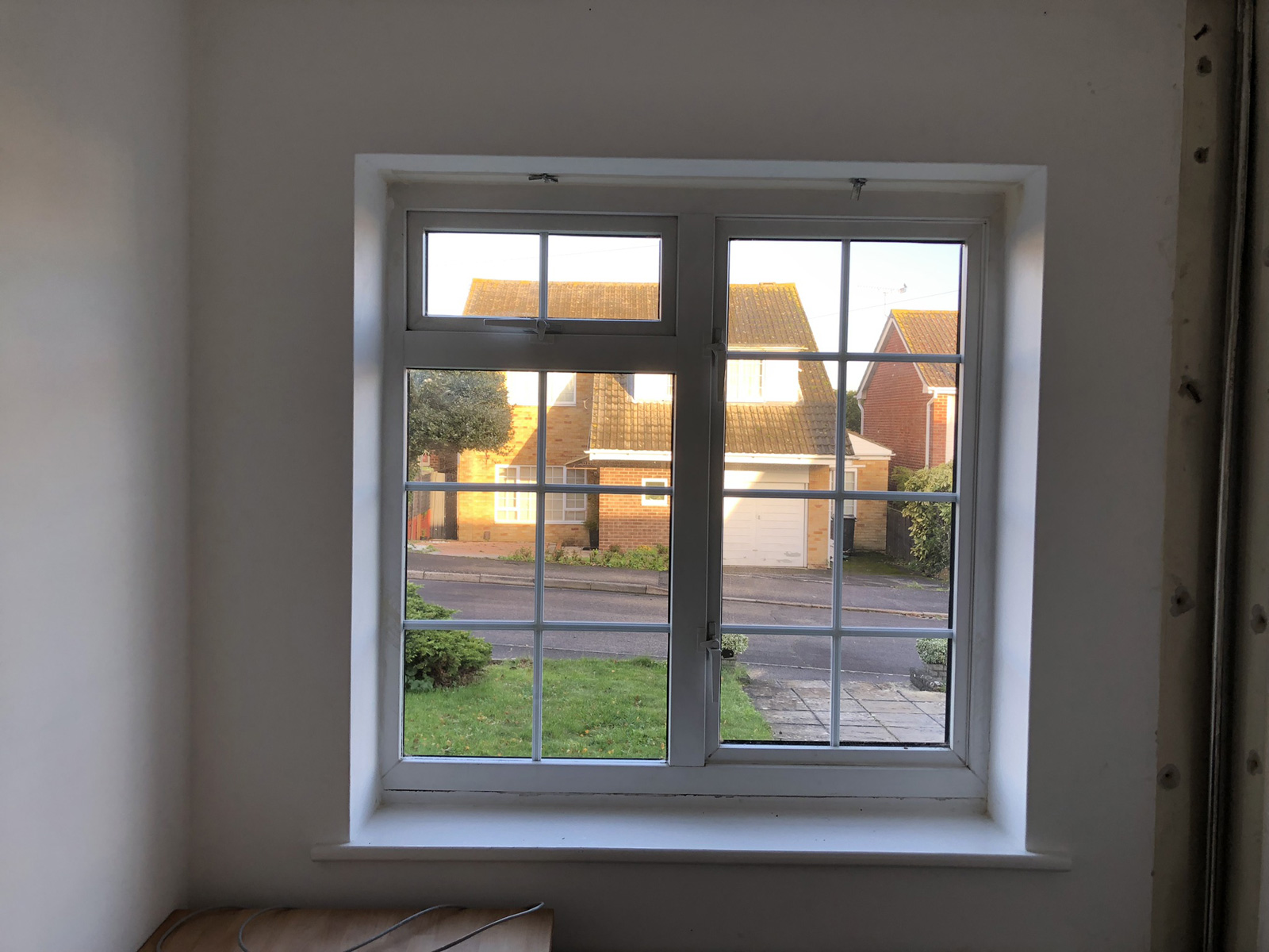 Old office window before replacement - 1970s double glazing with poor performance