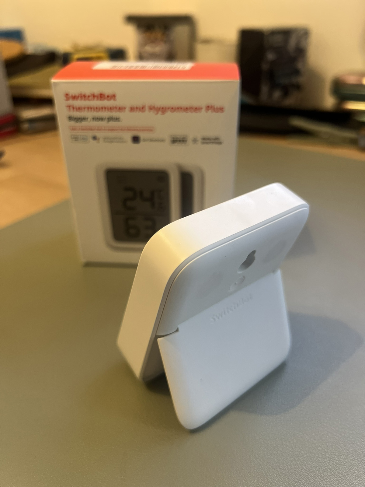 SwitchBot Meter Plus with kickstand extended for angled viewing