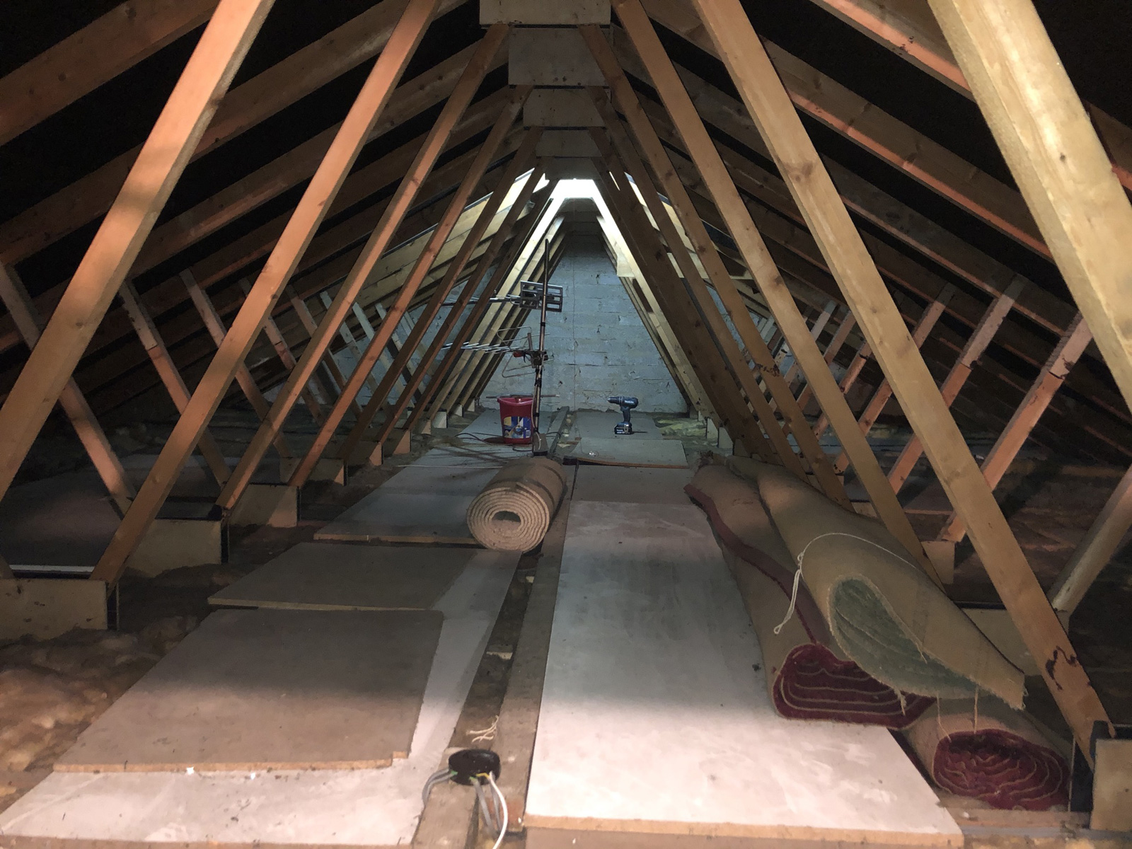 Starting loft insulation work showing 50mm existing insulation