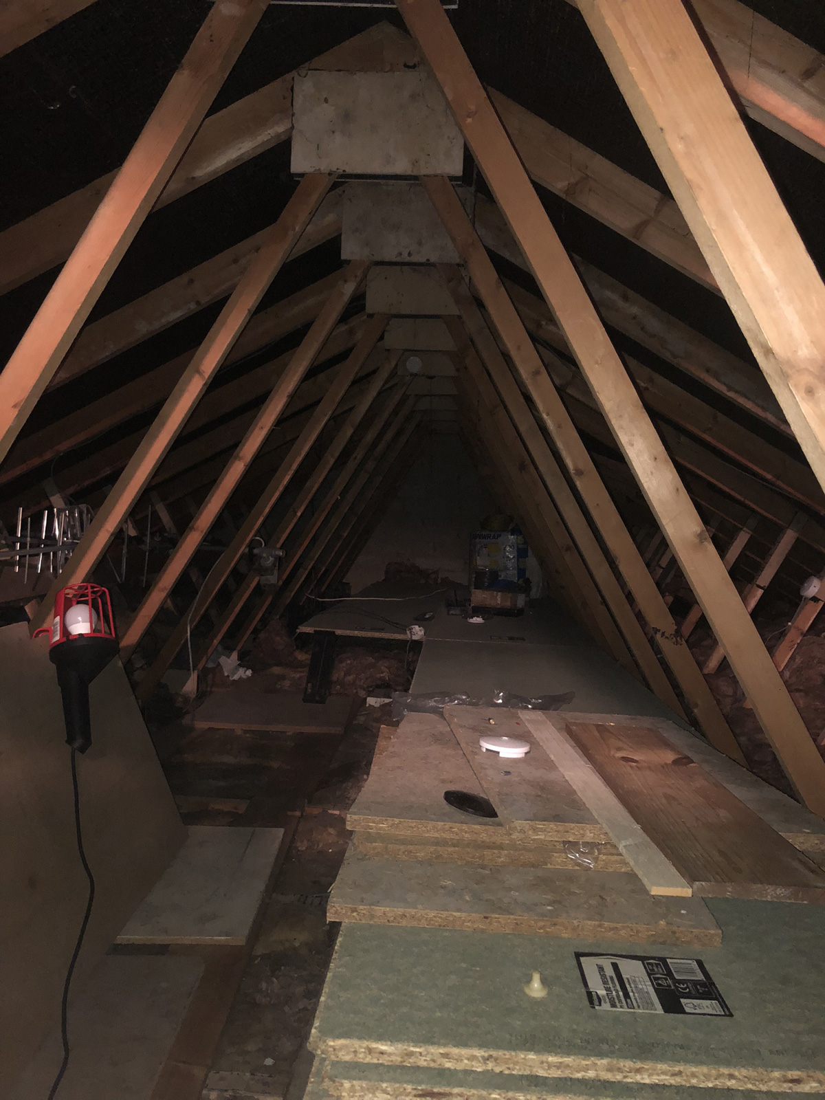 Electrical junction boxes installed on boards above insulation level